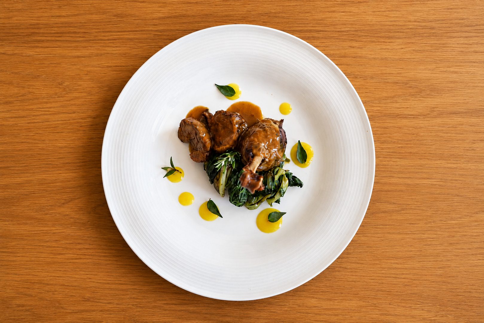 Stuffed Duck Leg Filled with Swiss chard and served with a citrus sauce